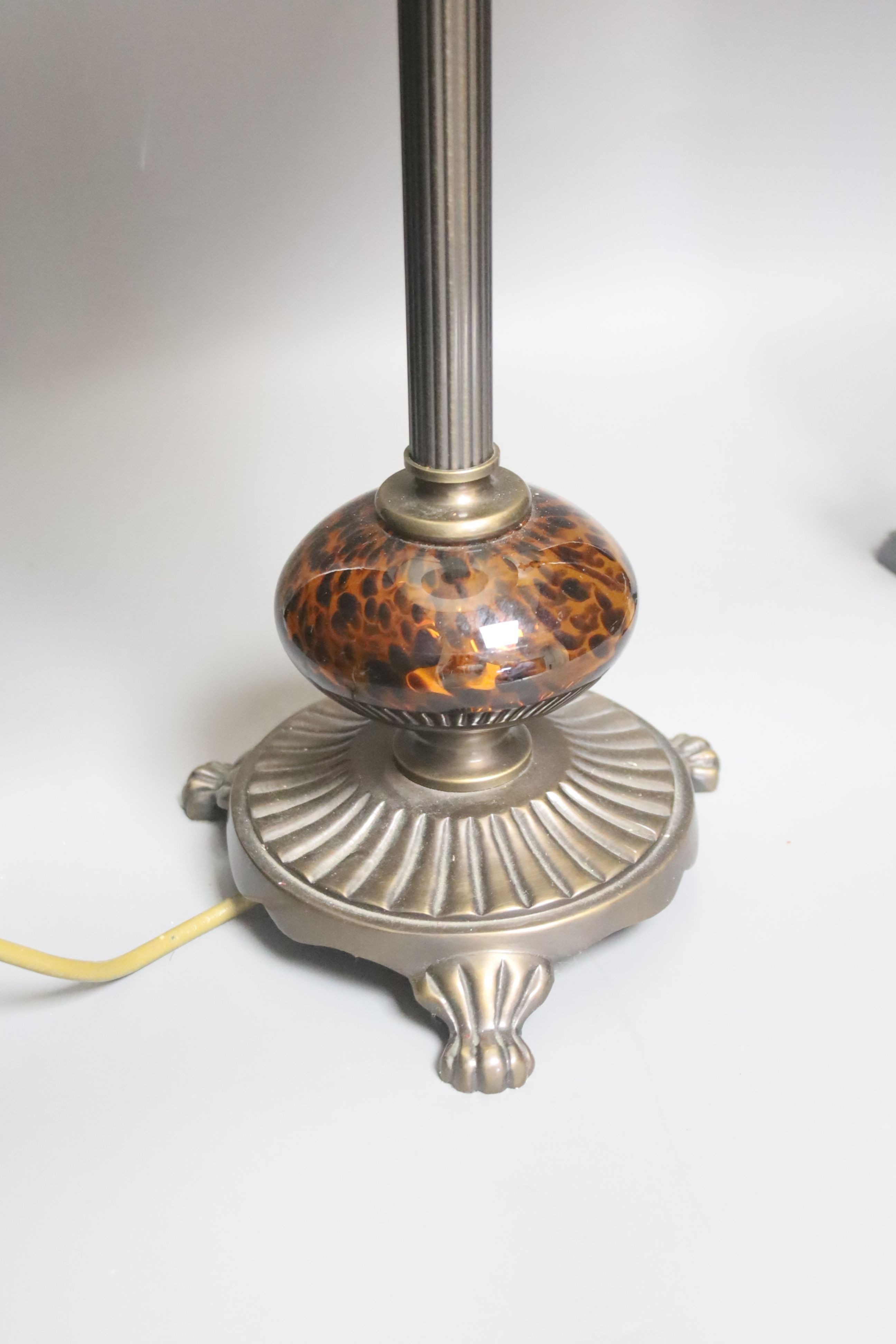A bronze table lamp with mottled brown glass fitting and a chromed adjustable lamp